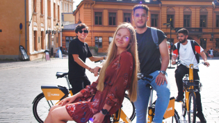 Four people in Turku riding bikes.